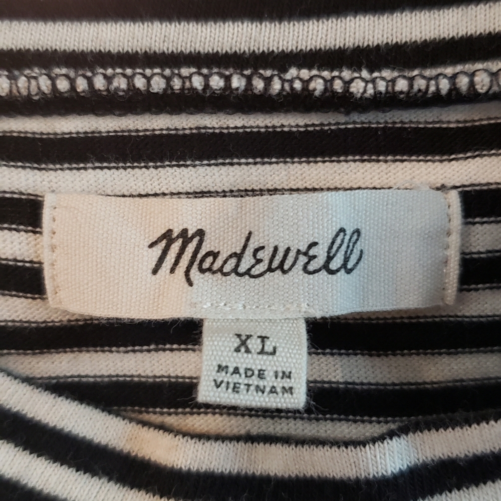 High neck black and white striped top.